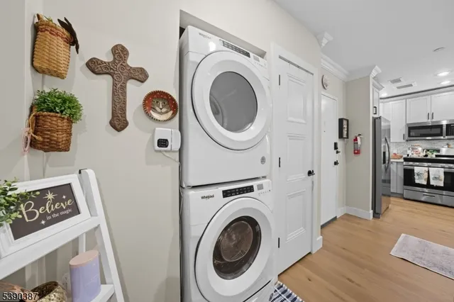 a view of a kitchen and utility room