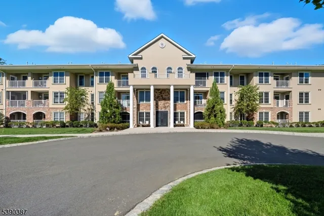front view of a house with a garden