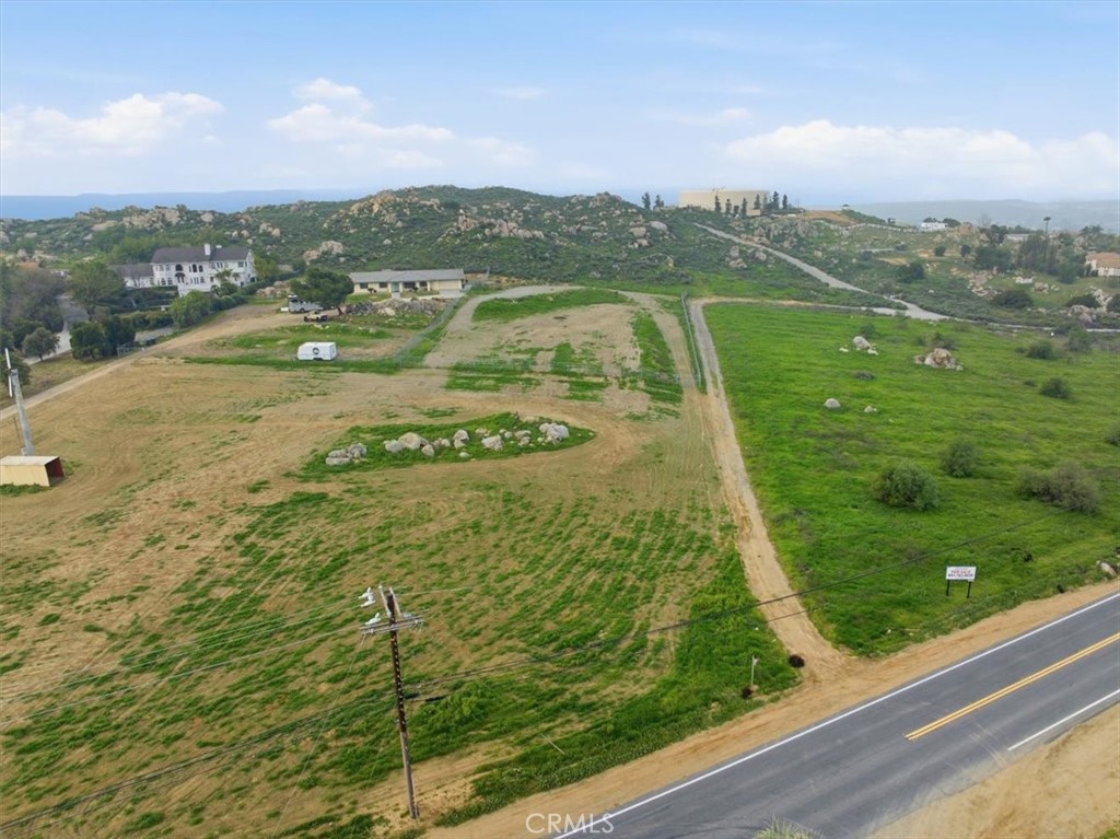 0 Harley John Road Riverside, CA 92504 - Photo 2 of 10 a view of a lake from a yard