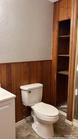 a bathroom with a toilet a sink and a toilet