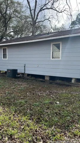 a view of a back yard of the house