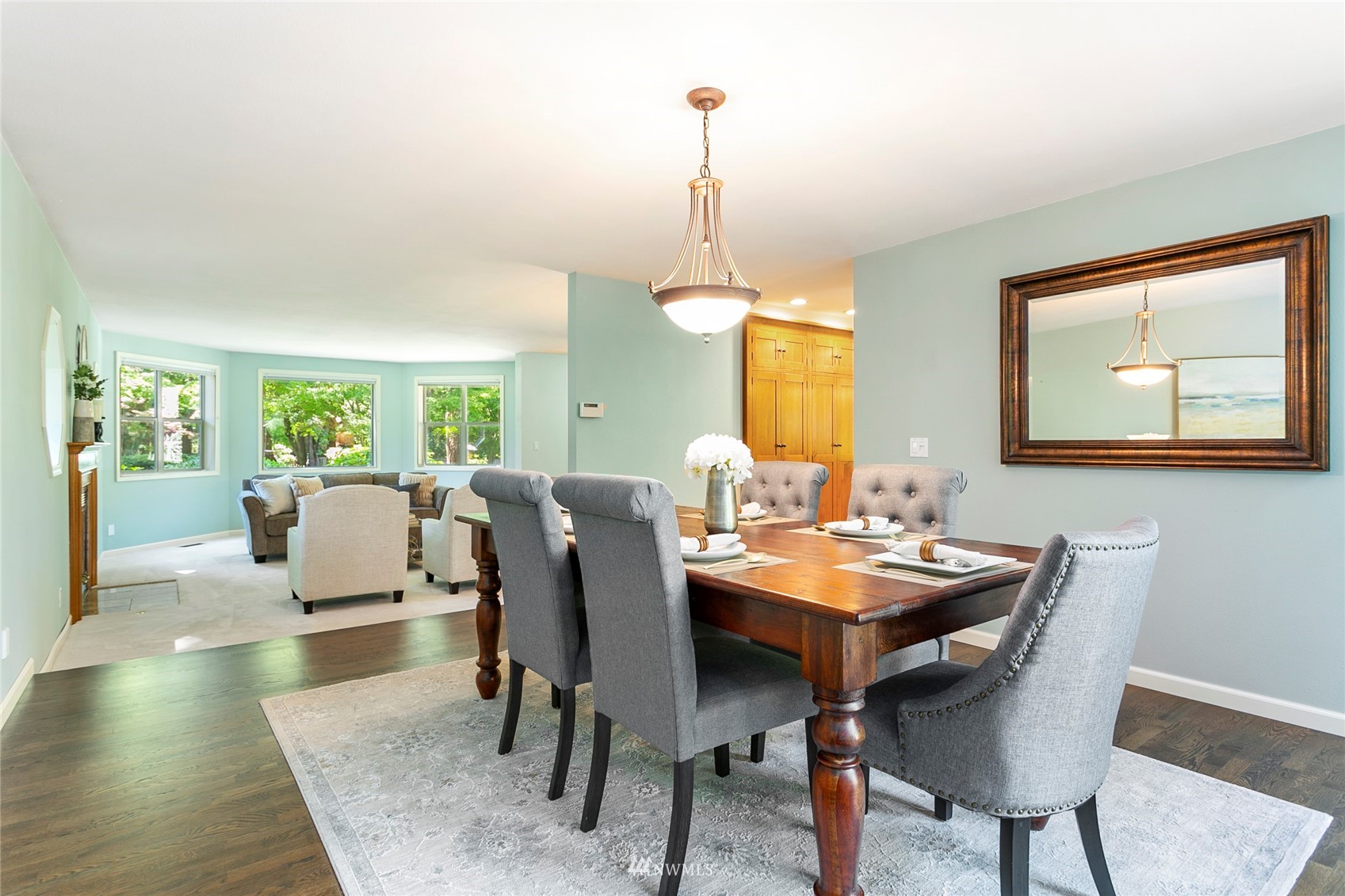 349 Viewcrest Road Bellingham, WA 98229 - Photo 18 of 36 a view of a dining room with furniture and wooden floor