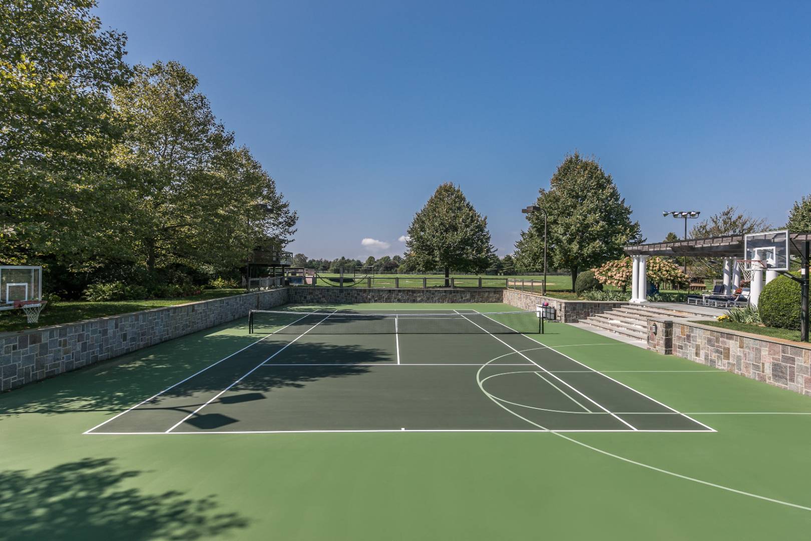 612 Halsey Lane Bridgehampton, NY 11932 - Photo 20 of 31 a view of a tennis court