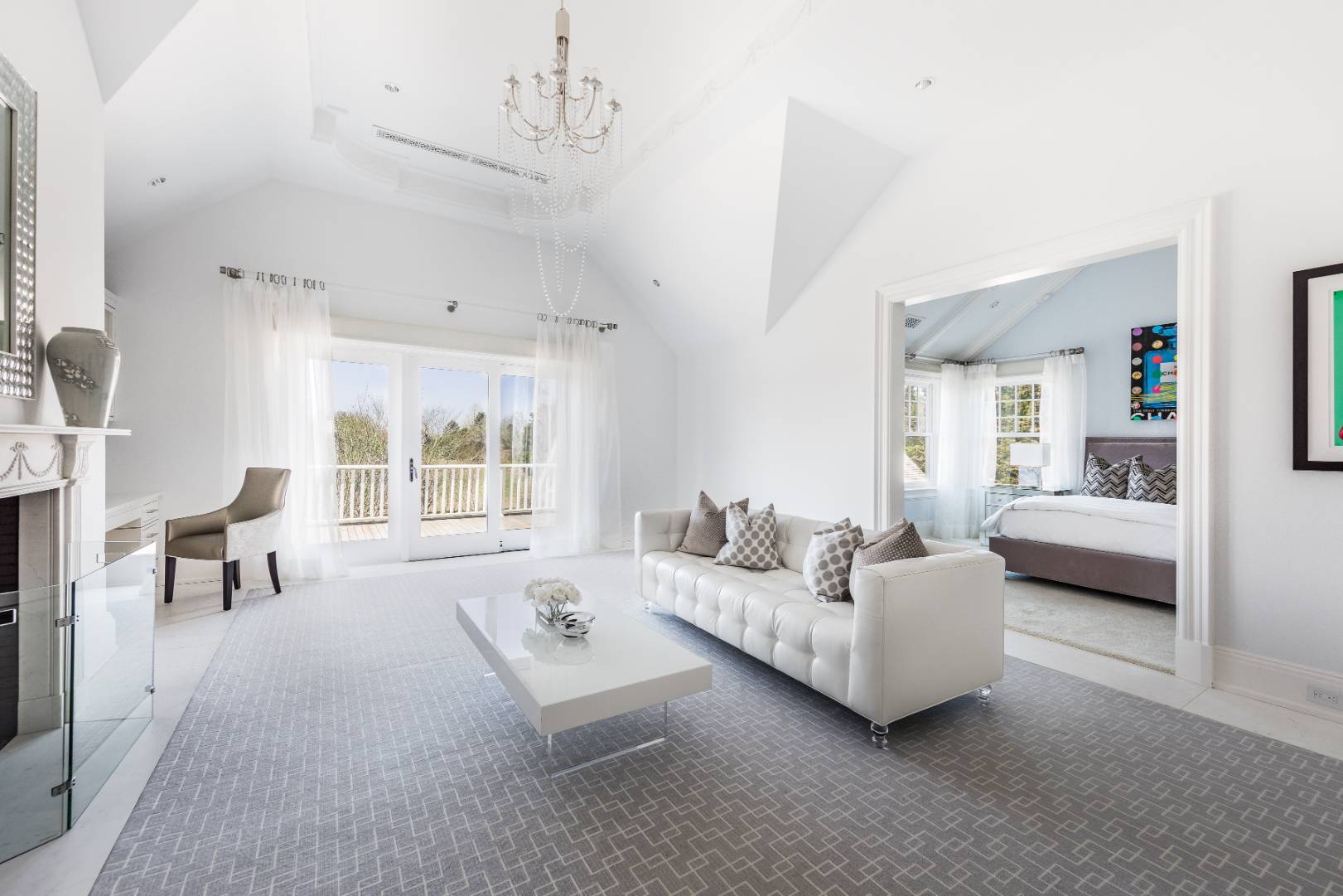 612 Halsey Lane Bridgehampton, NY 11932 - Photo 23 of 31 a living room with furniture and a large window