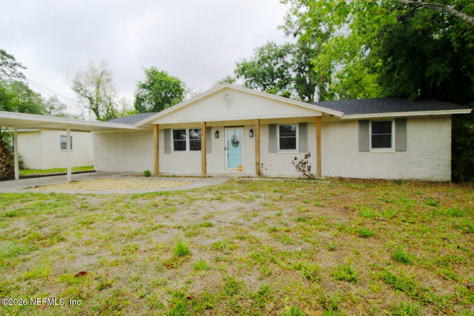 7762 Knoll Drive South Jacksonville, FL 32221 - Photo 1 of 22 a view of a house with a yard