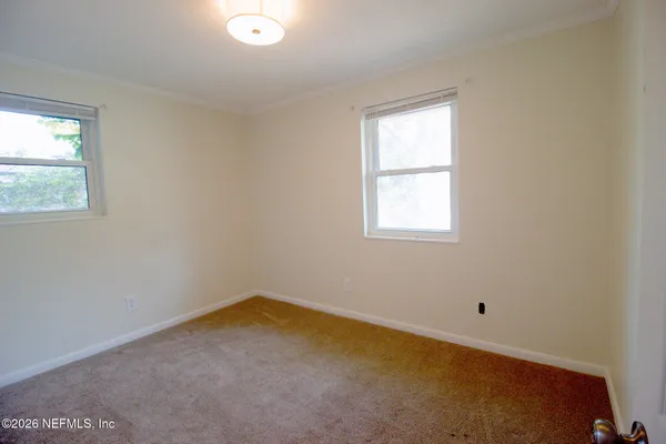 an empty room with a window