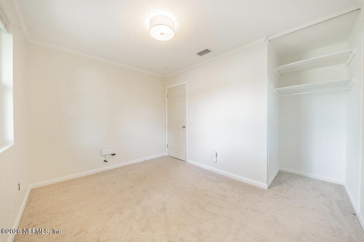 7762 Knoll Drive South Jacksonville, FL 32221 - Photo 18 of 22 an empty room with a empty space