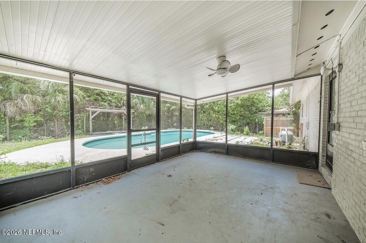7762 Knoll Drive South Jacksonville, FL 32221 - Photo 19 of 22 a view of an empty room with windows