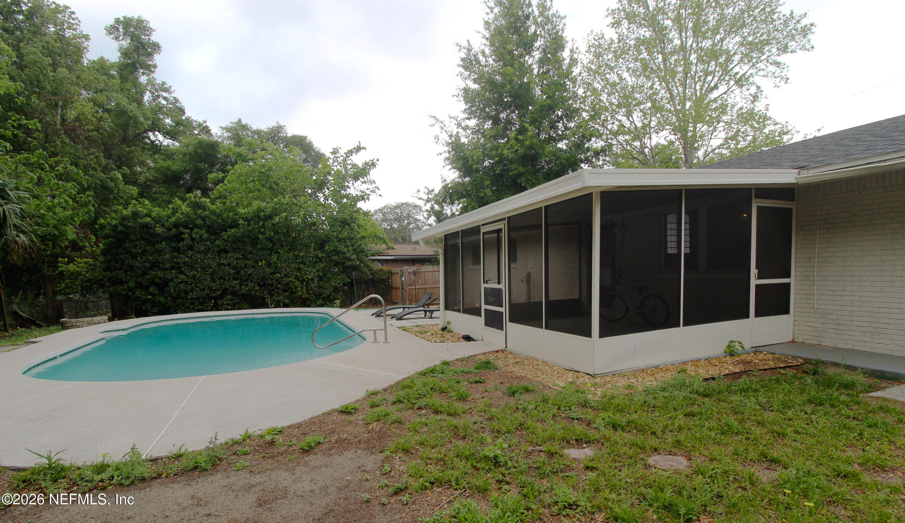 7762 Knoll Drive South Jacksonville, FL 32221 - Photo 20 of 22 a view of a backyard with a large tree