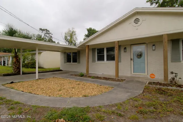a view of a house with a patio