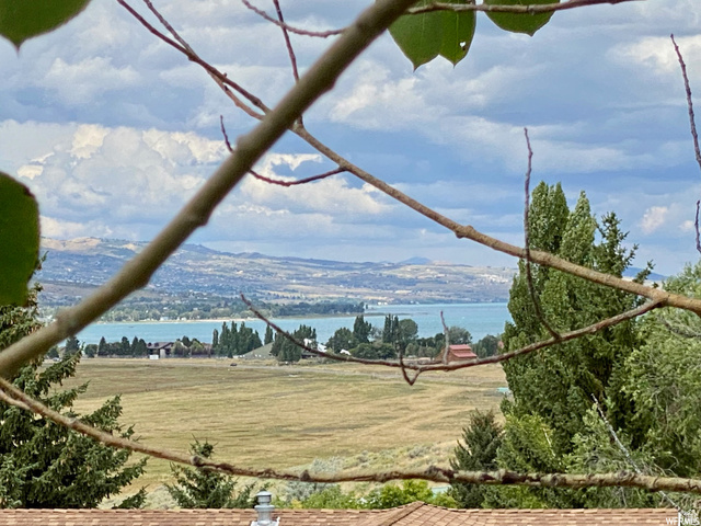 972 Ridgeway Loop, Unit 228 Garden City, UT 84028 - Photo 5 of 26 Water view featuring a mountainous background