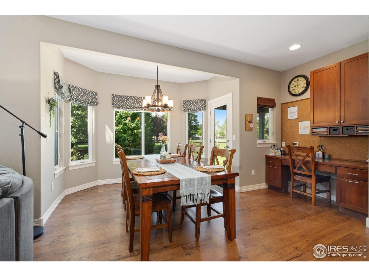 6523 Aberdour Circle Windsor, CO 80550 - Photo 12 of 40 a view of a dining room with furniture window and outside view