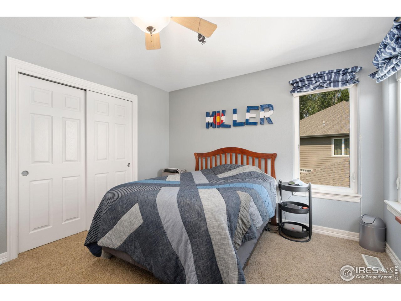 6523 Aberdour Circle Windsor, CO 80550 - Photo 22 of 40 a bedroom with a bed and a window