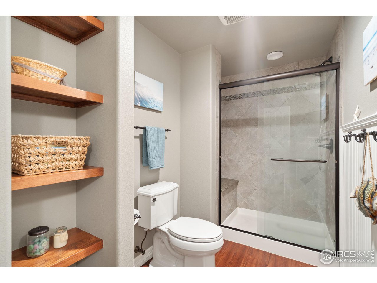 6523 Aberdour Circle Windsor, CO 80550 - Photo 31 of 40 a bathroom with a toilet and a shower