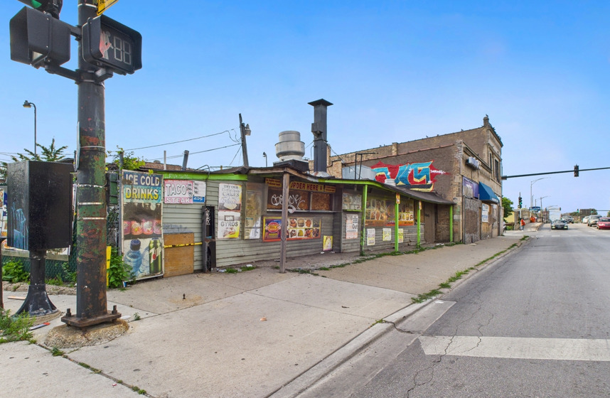 a view of a street with cars