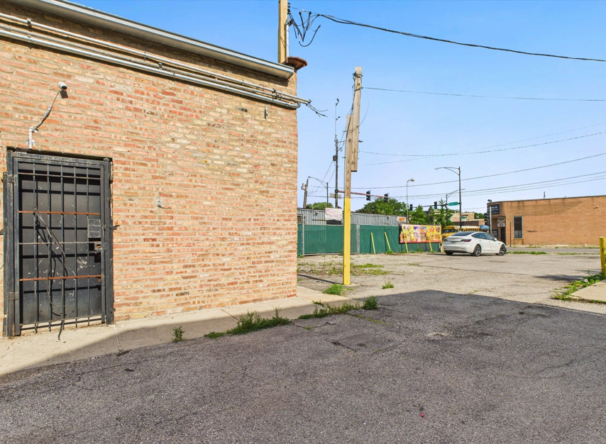 600-606 South Pulaski Road Chicago, IL 60624 - Photo 18 of 18 a car parked on the side of the road