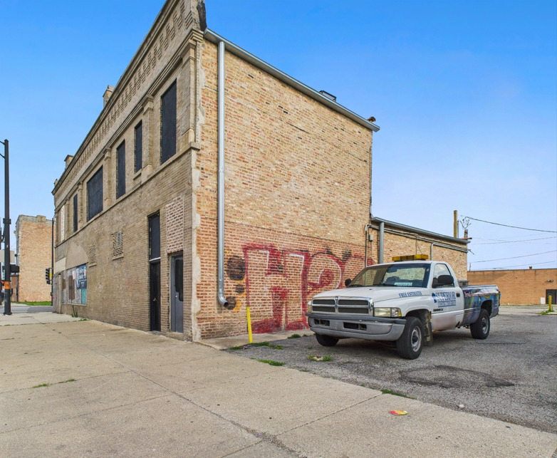 600-606 South Pulaski Road Chicago, IL 60624 - Photo 2 of 18 a view of a car park in front of house