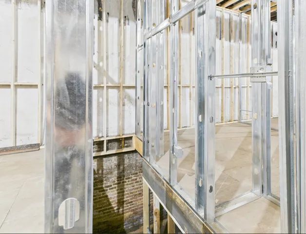 a view of a balcony with wooden floor
