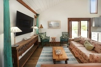 11 Sunset Drive Newbury, MA 01951 - Photo 7 of 16 a living room with furniture and a flat screen tv