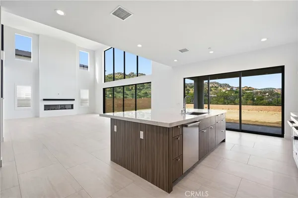 an empty room with large window