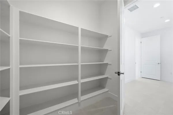 a view of an empty walk in closet