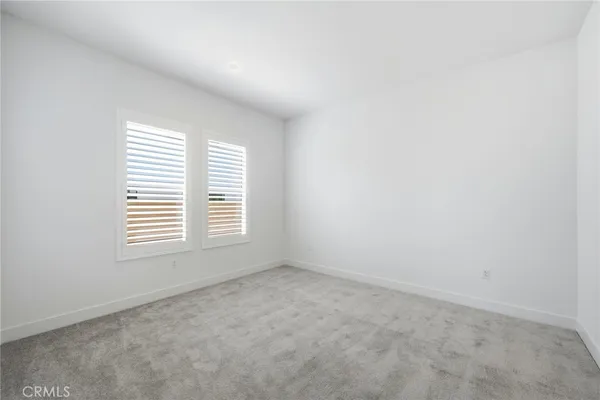a view of swimming pool with outdoor seating and a yard
