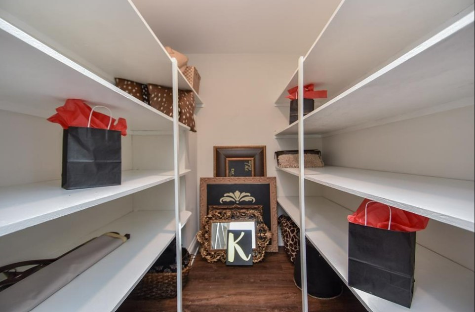 1506 10th Street Hempstead, TX 77445 - Photo 23 of 31 a room with storage and utility