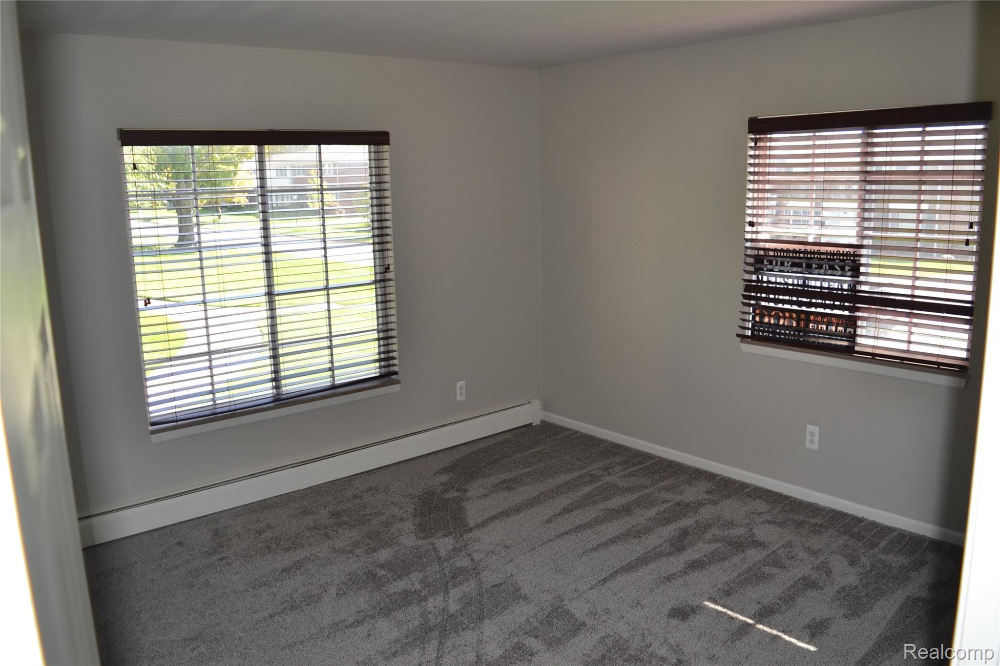 451 Miller Avenue, Unit 111 Rochester, MI 48307 - Photo 15 of 26 15 - Master Bedroom.JPG