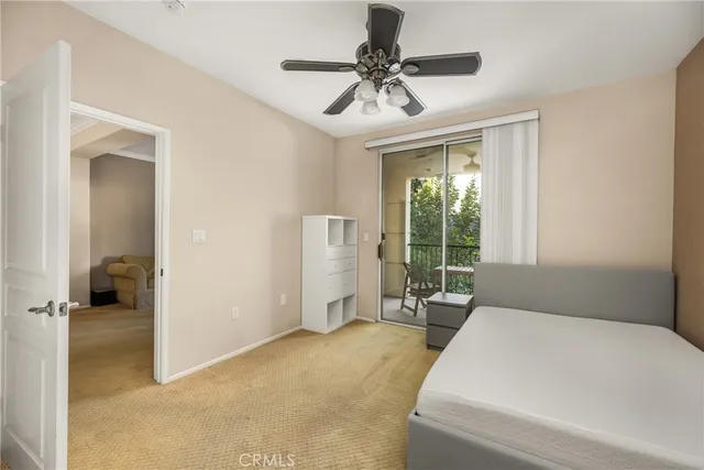 a living room with furniture and windows