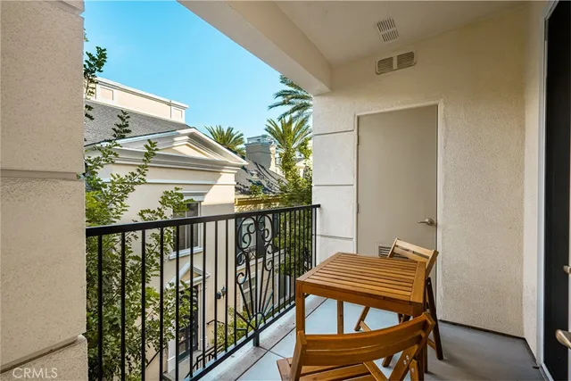 a view of a balcony with furniture