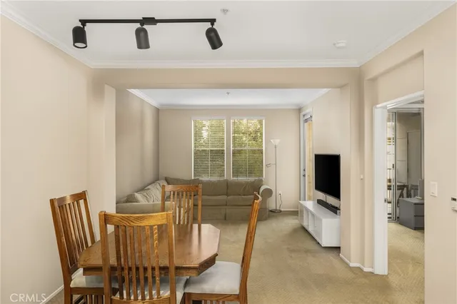 a view of a dining room with furniture window and outside view