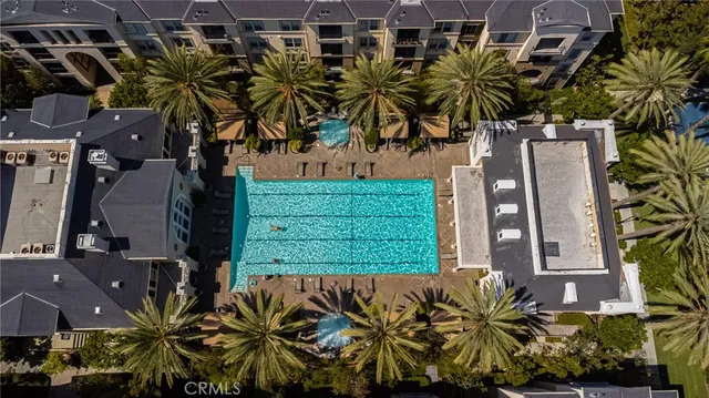 an aerial view of a house with a garden