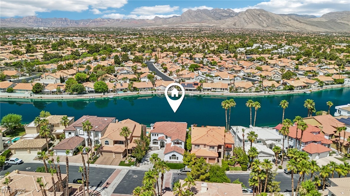 2469 Sun Reef Road Las Vegas, NV 89128 - Photo 86 of 93 Aerial perspective of suburban area featuring a water and mountain view