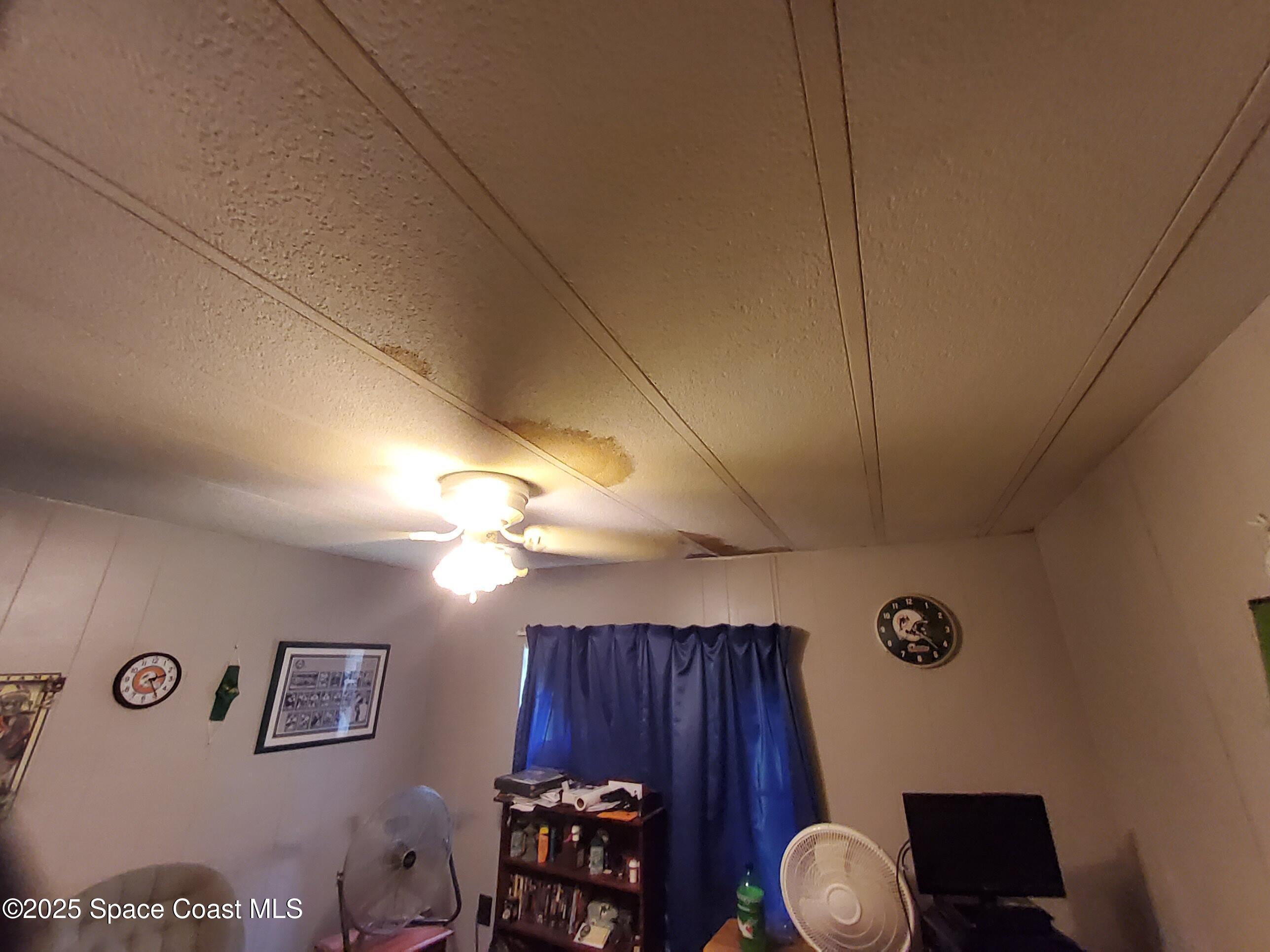 522 Clearview Drive Cocoa, FL 32927 - Photo 11 of 43 a view of a livingroom with furniture and a fan