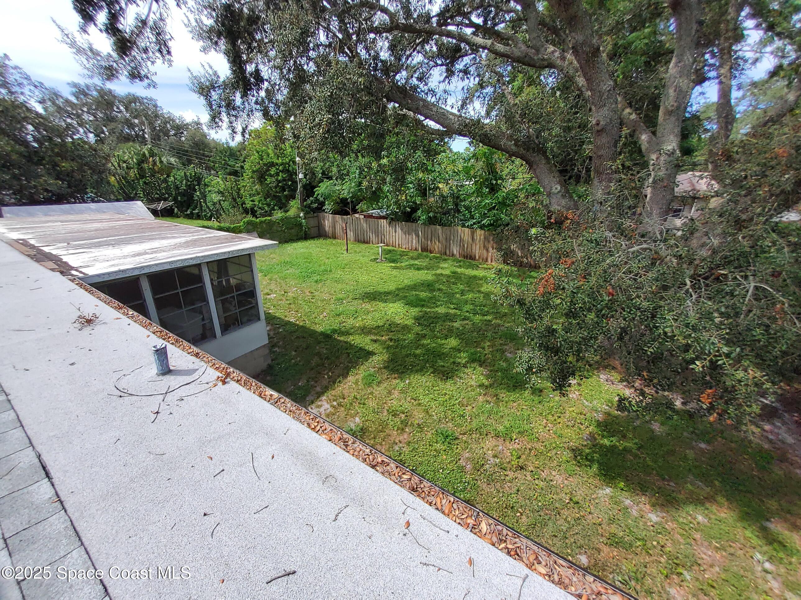 522 Clearview Drive Cocoa, FL 32927 - Photo 12 of 43 a view of a house with a yard