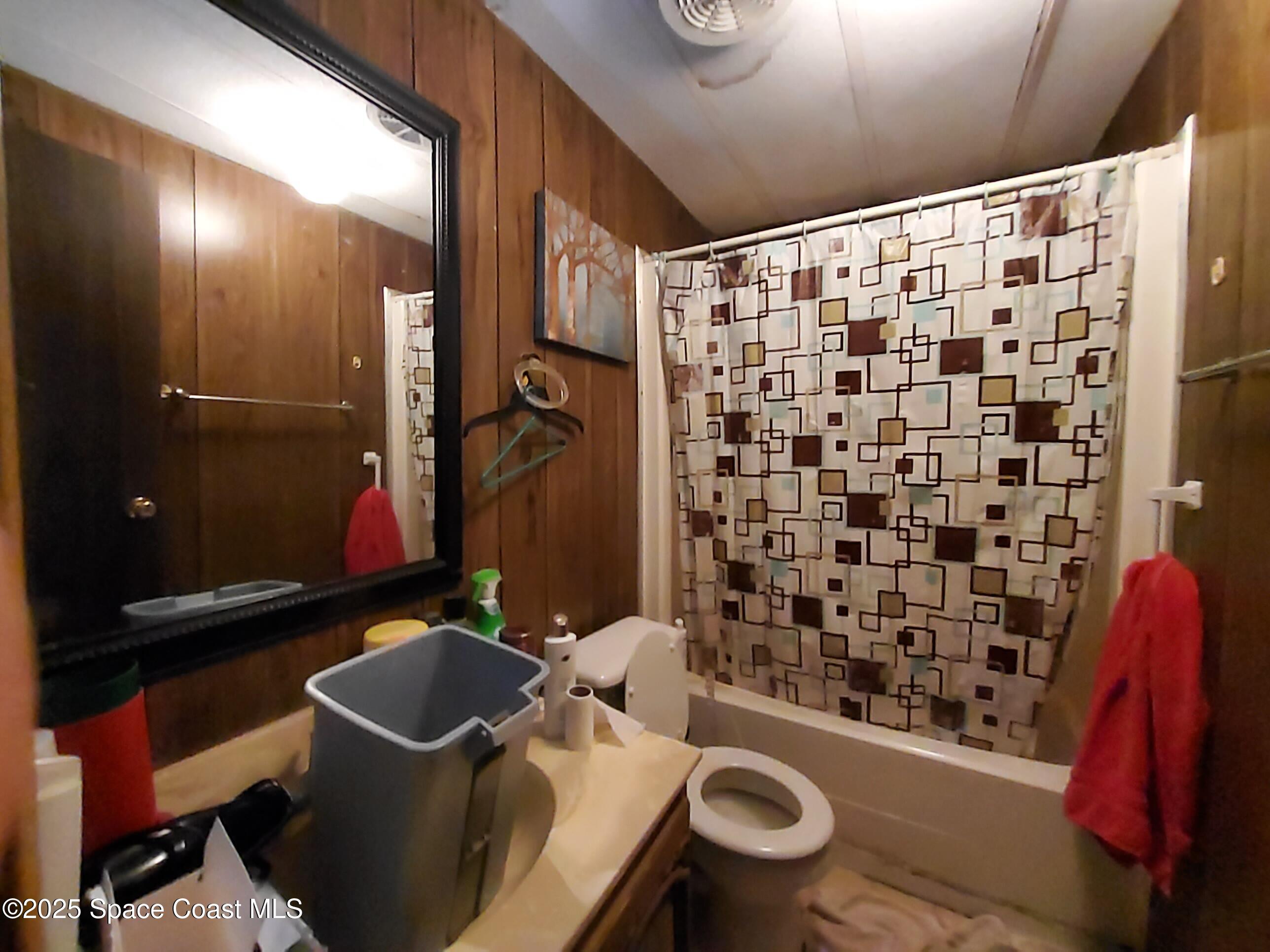 522 Clearview Drive Cocoa, FL 32927 - Photo 13 of 43 a bathroom with a sink toilet and shower