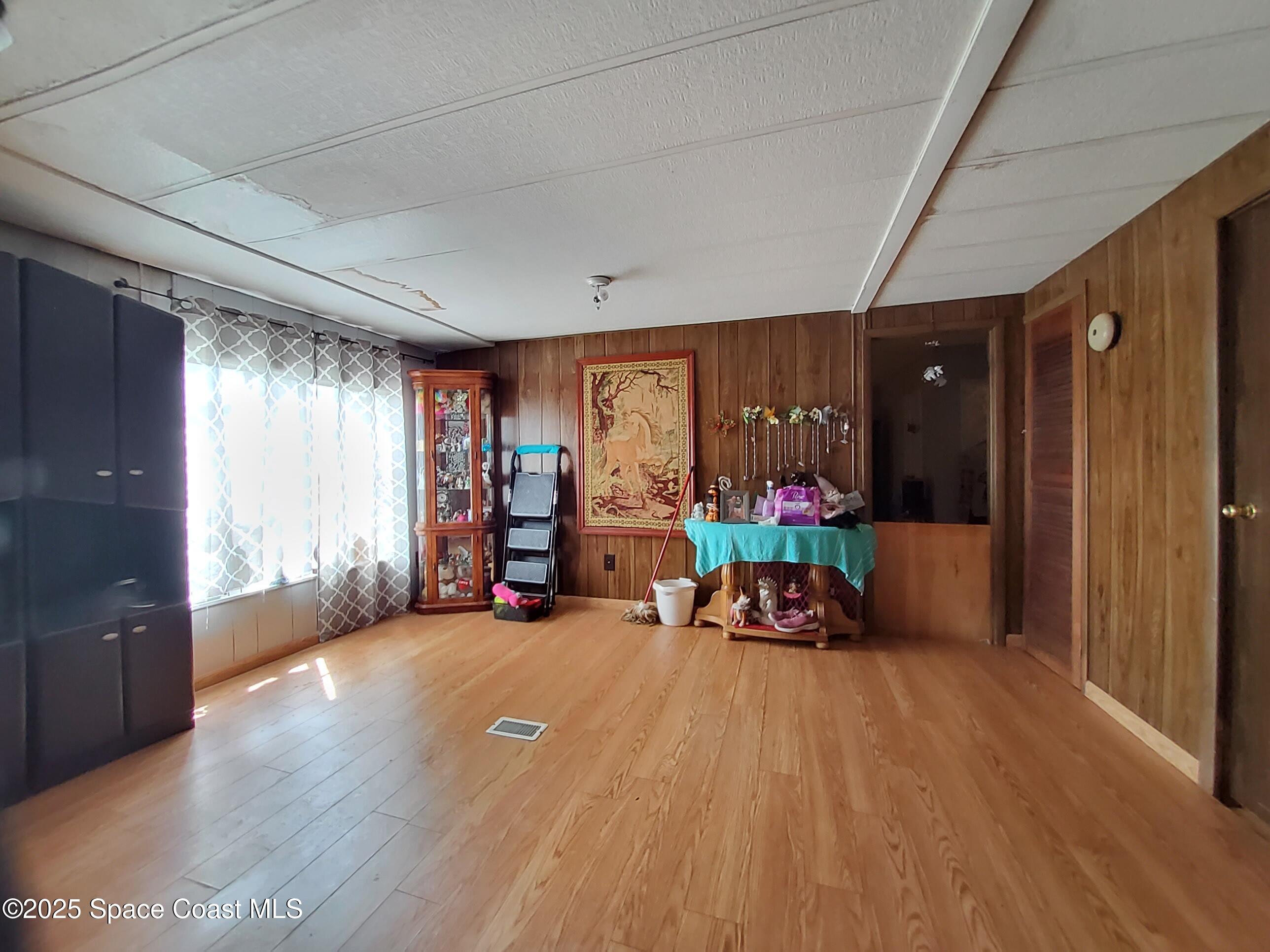 522 Clearview Drive Cocoa, FL 32927 - Photo 2 of 43 a living room with furniture and a large window
