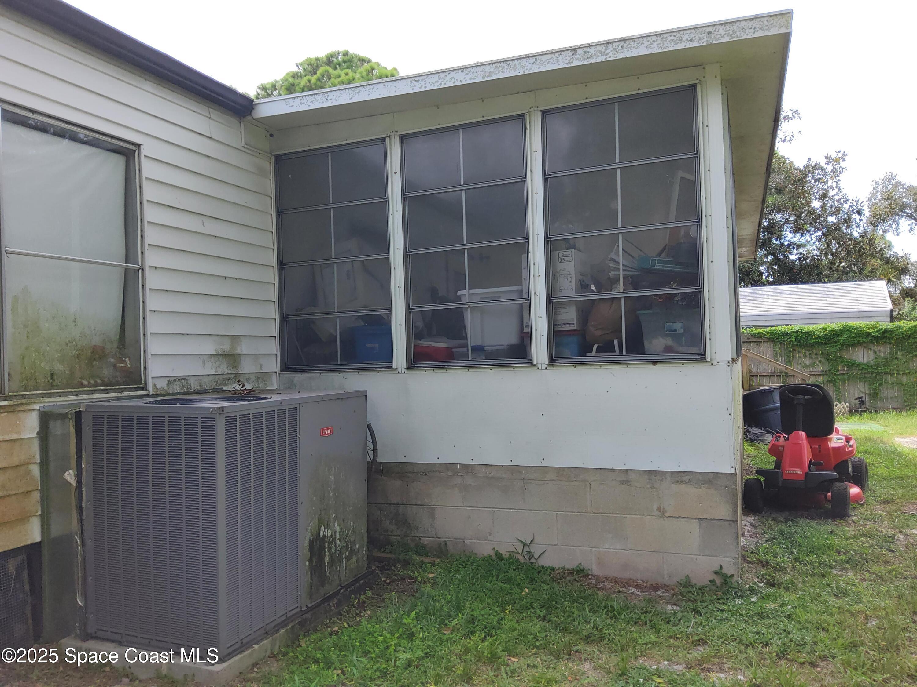 522 Clearview Drive Cocoa, FL 32927 - Photo 27 of 43 a front view of a house with a yard