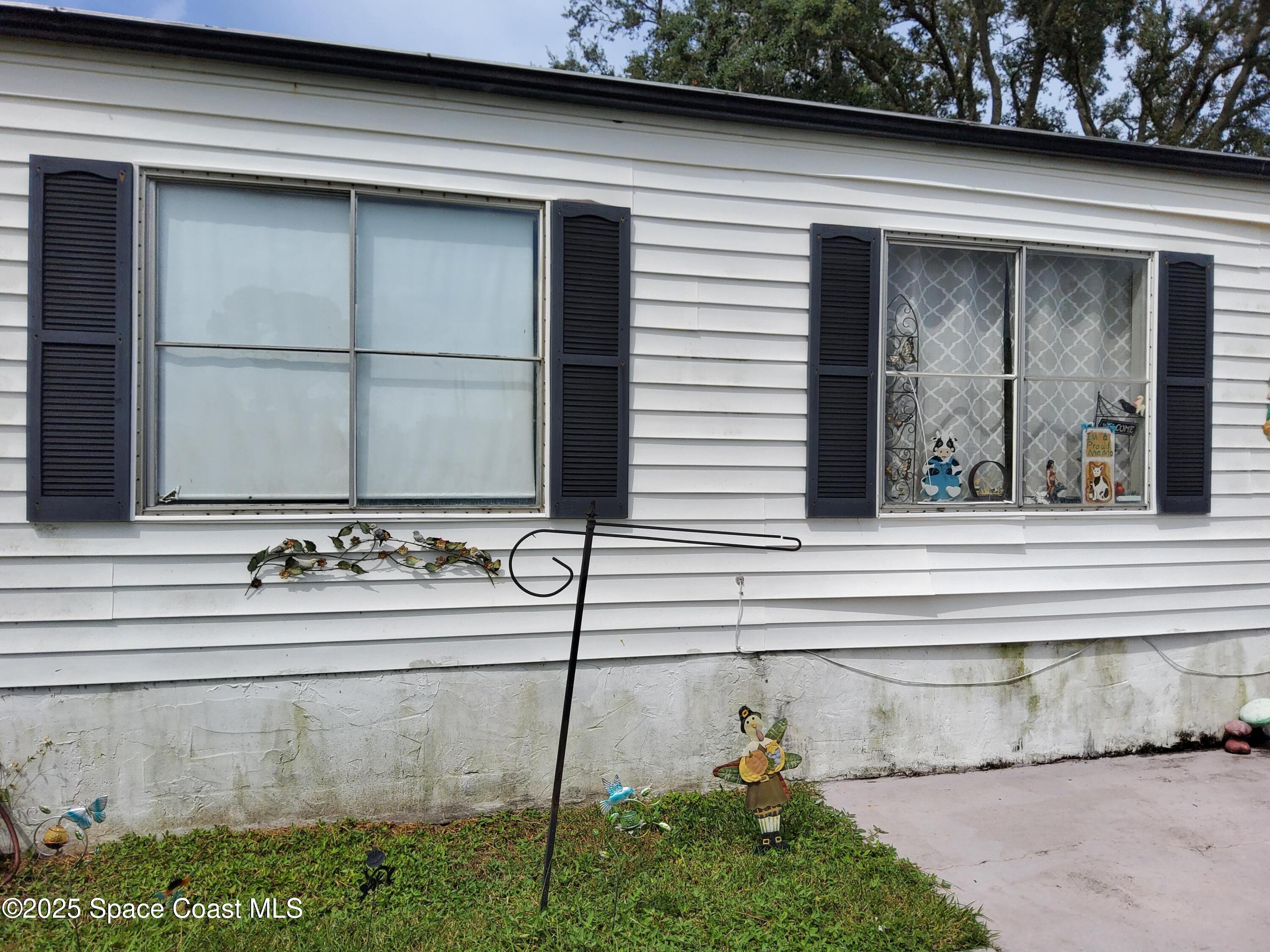 522 Clearview Drive Cocoa, FL 32927 - Photo 28 of 43 a bathroom with a sink and mirror