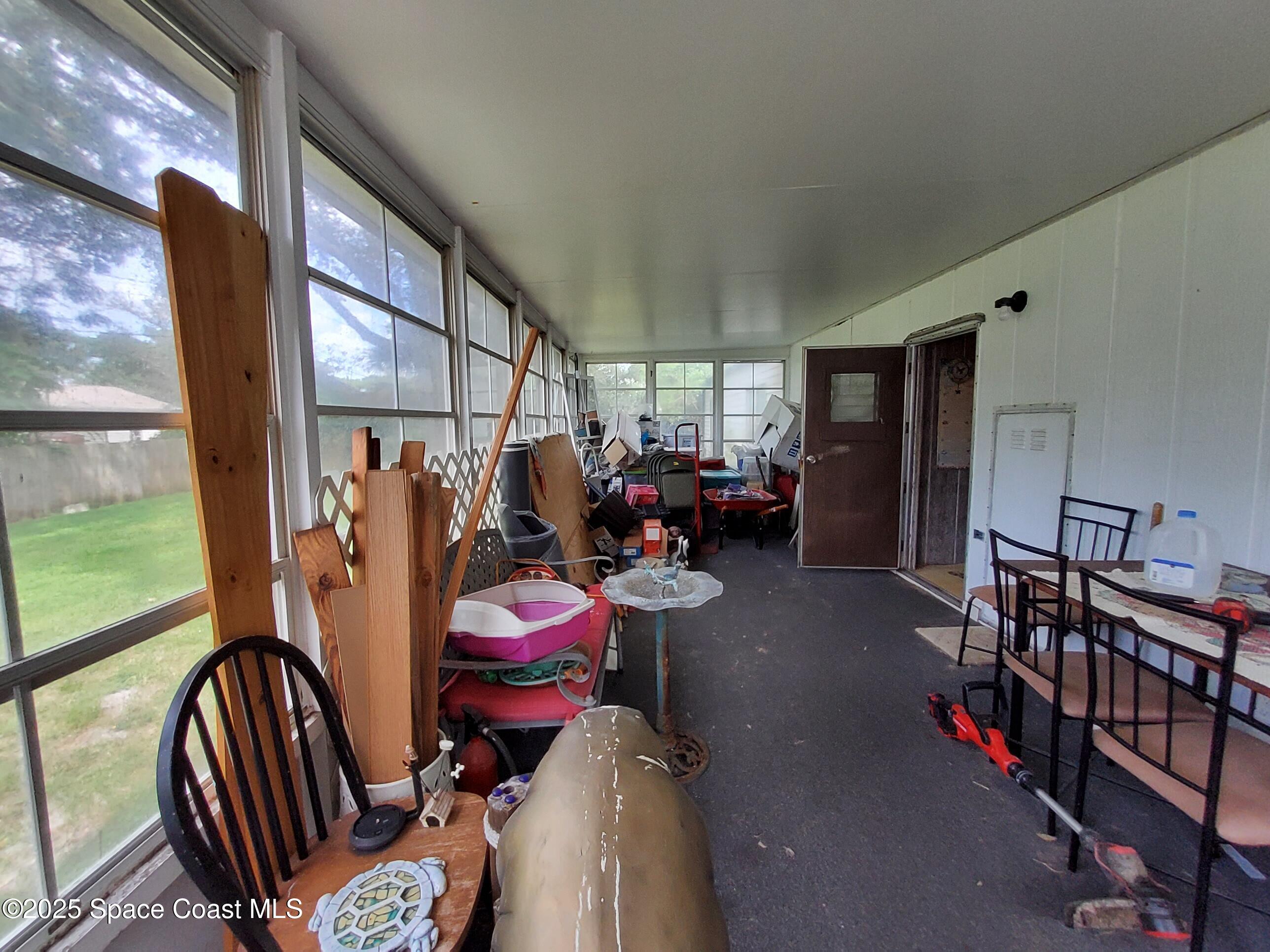 522 Clearview Drive Cocoa, FL 32927 - Photo 30 of 43 a view of a room with gym equipment