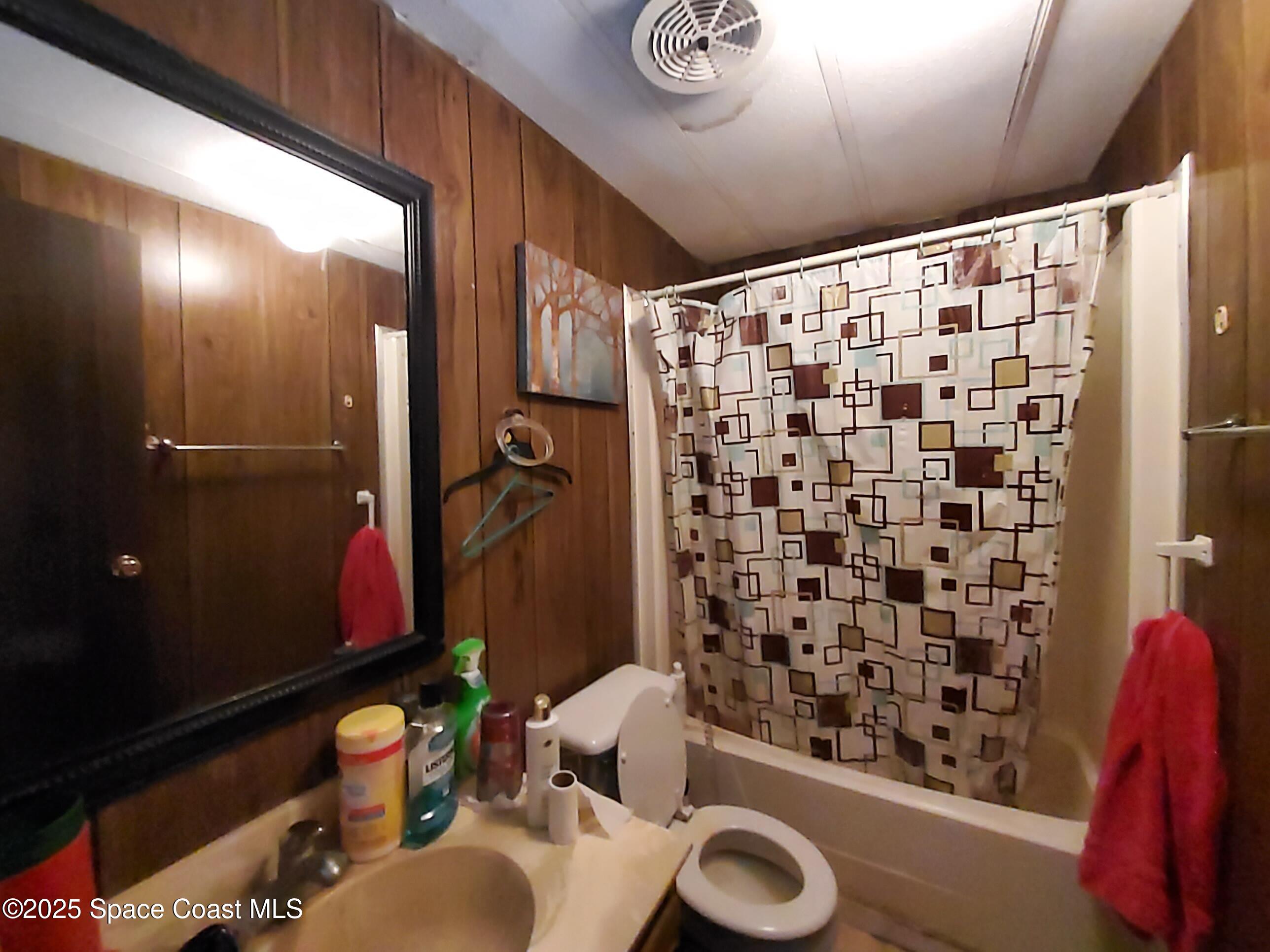 522 Clearview Drive Cocoa, FL 32927 - Photo 35 of 43 a bathroom with a sink toilet and shower