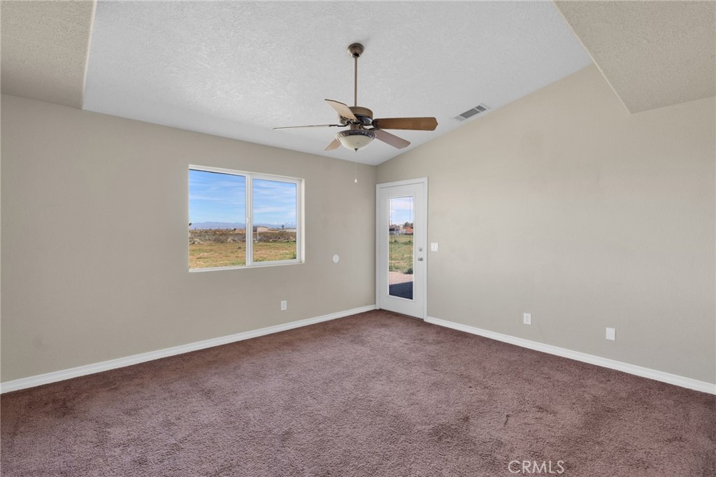 12865 Barbet Road Phelan, CA 92371 - Photo 25 of 51 a view of an empty room with a window
