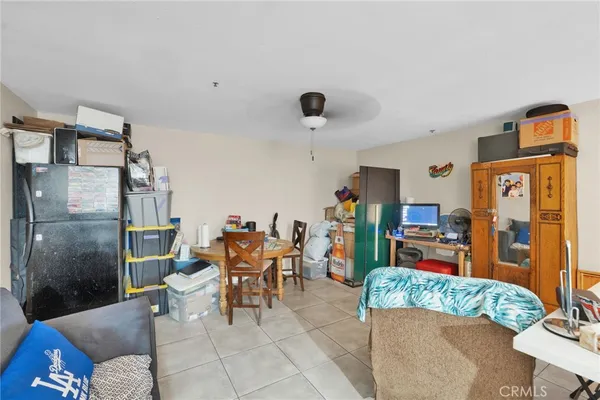 a kitchen with a sink appliances and cabinets