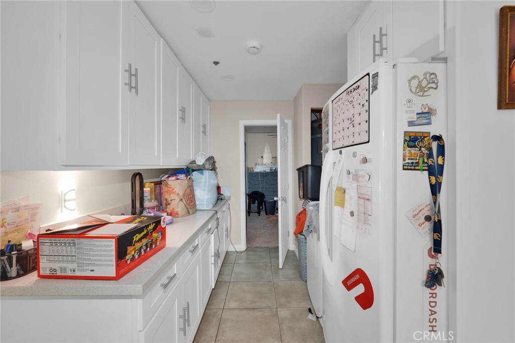 12865 Barbet Road Phelan, CA 92371 - Photo 40 of 51 a room with storage and utility