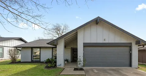 a front view of house with yard