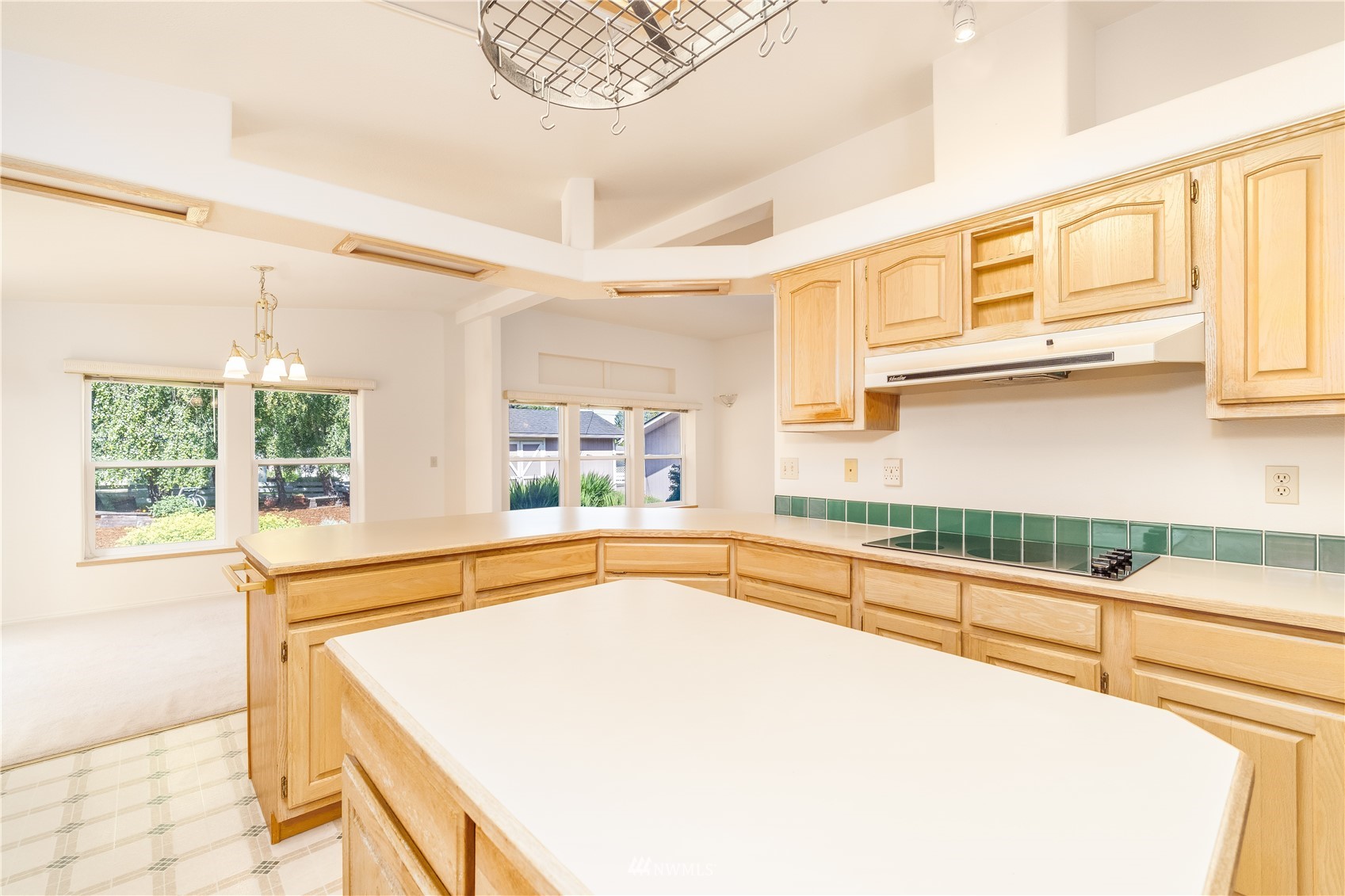 2192 Finn Hall Road Port Angeles, WA 98362 - Photo 13 of 40 a view of a kitchen with a large window and furniture