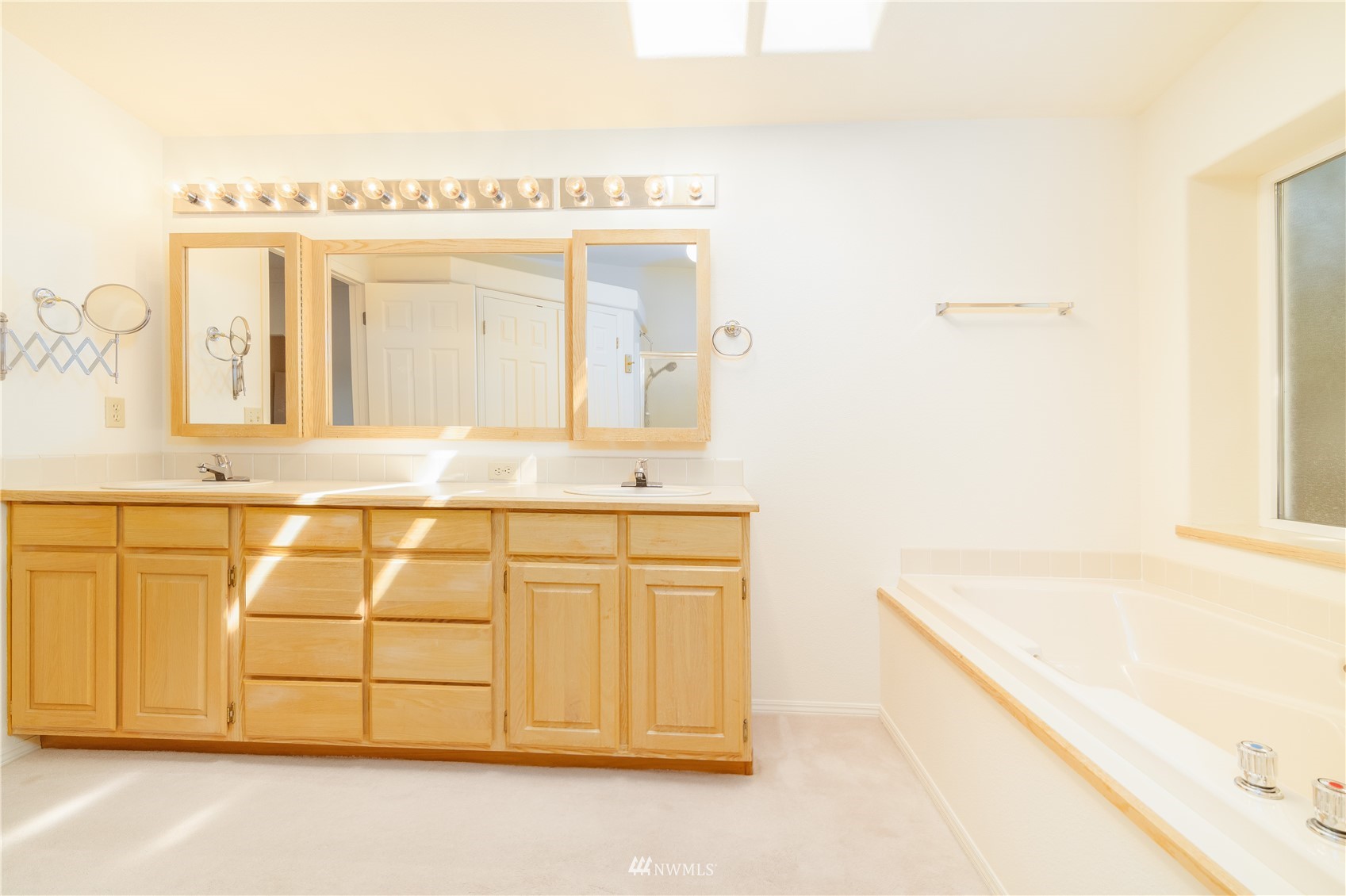 2192 Finn Hall Road Port Angeles, WA 98362 - Photo 23 of 40 a bathroom with a tub sink and a mirror