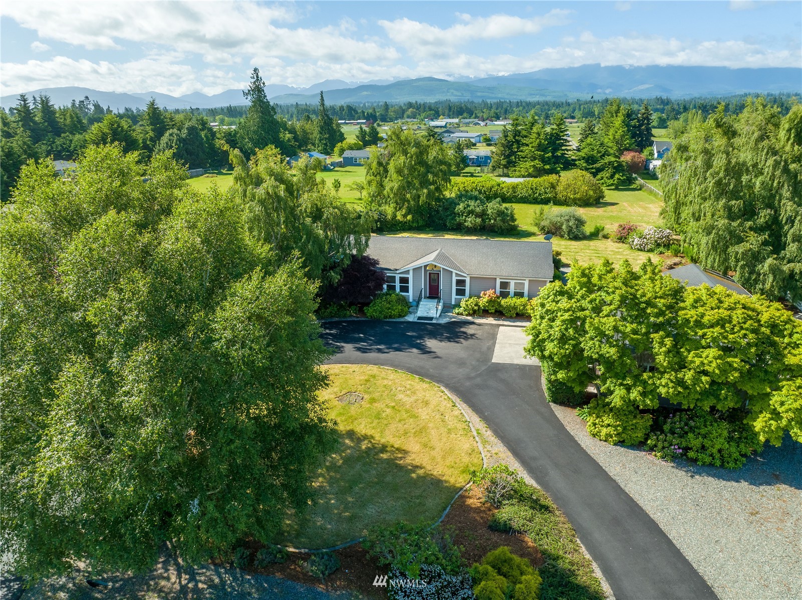 2192 Finn Hall Road Port Angeles, WA 98362 - Photo 35 of 40 a view of a swimming pool with a yard
