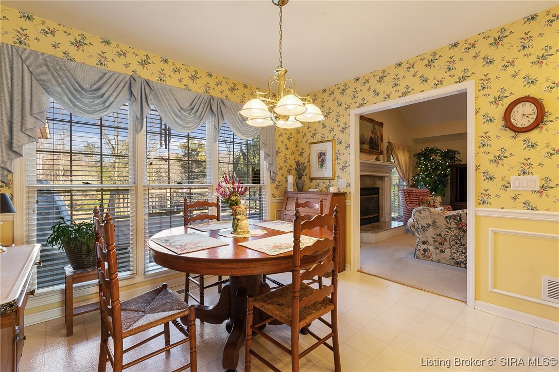 2001 Spring Creek Drive Floyds Knobs, IN 47119 - Photo 12 of 63 Lovely eat-in area with lots of natural light open
