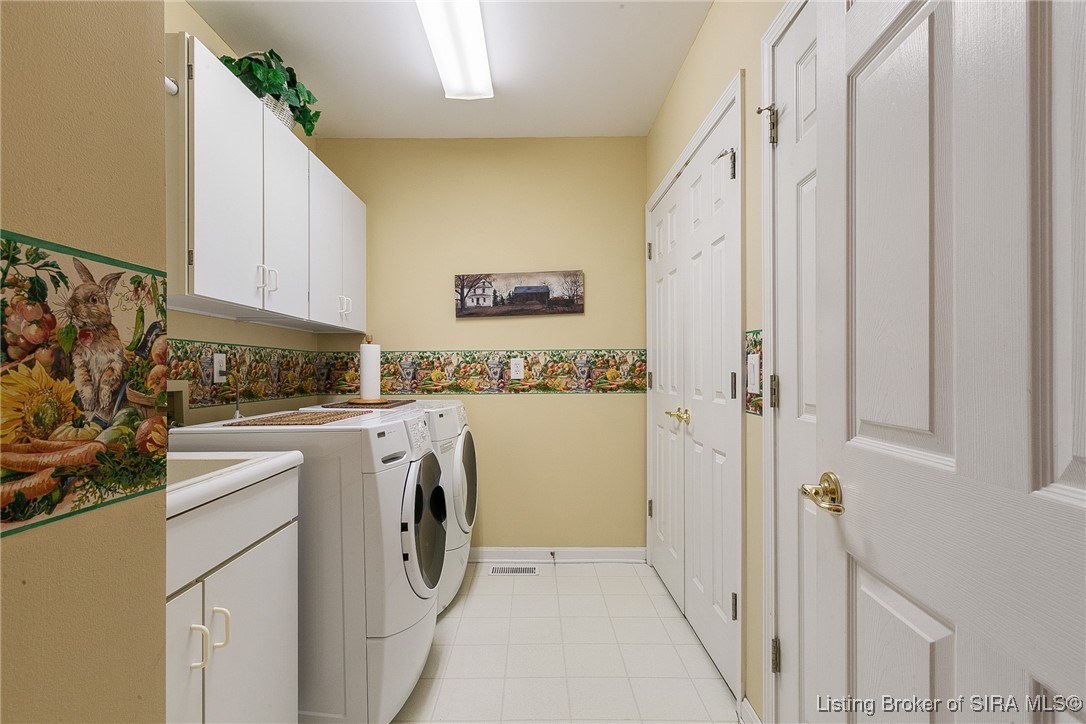 2001 Spring Creek Drive Floyds Knobs, IN 47119 - Photo 16 of 63 Generous size laundry with utility sink, built in